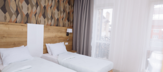 Гостиница Парк-Отель Маликон Таганрог Улучшенный стандартный номер с 2 отдельными кроватями-2