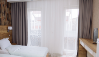 Гостиница Парк-Отель Маликон Таганрог Улучшенный стандартный номер с 2 отдельными кроватями-5